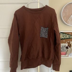 Krochet Kids Burnt brown pocket crewneck